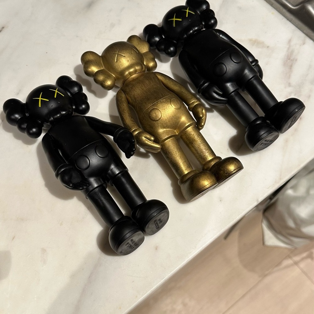 Kaws statue 3 for $1400 or separately for $500